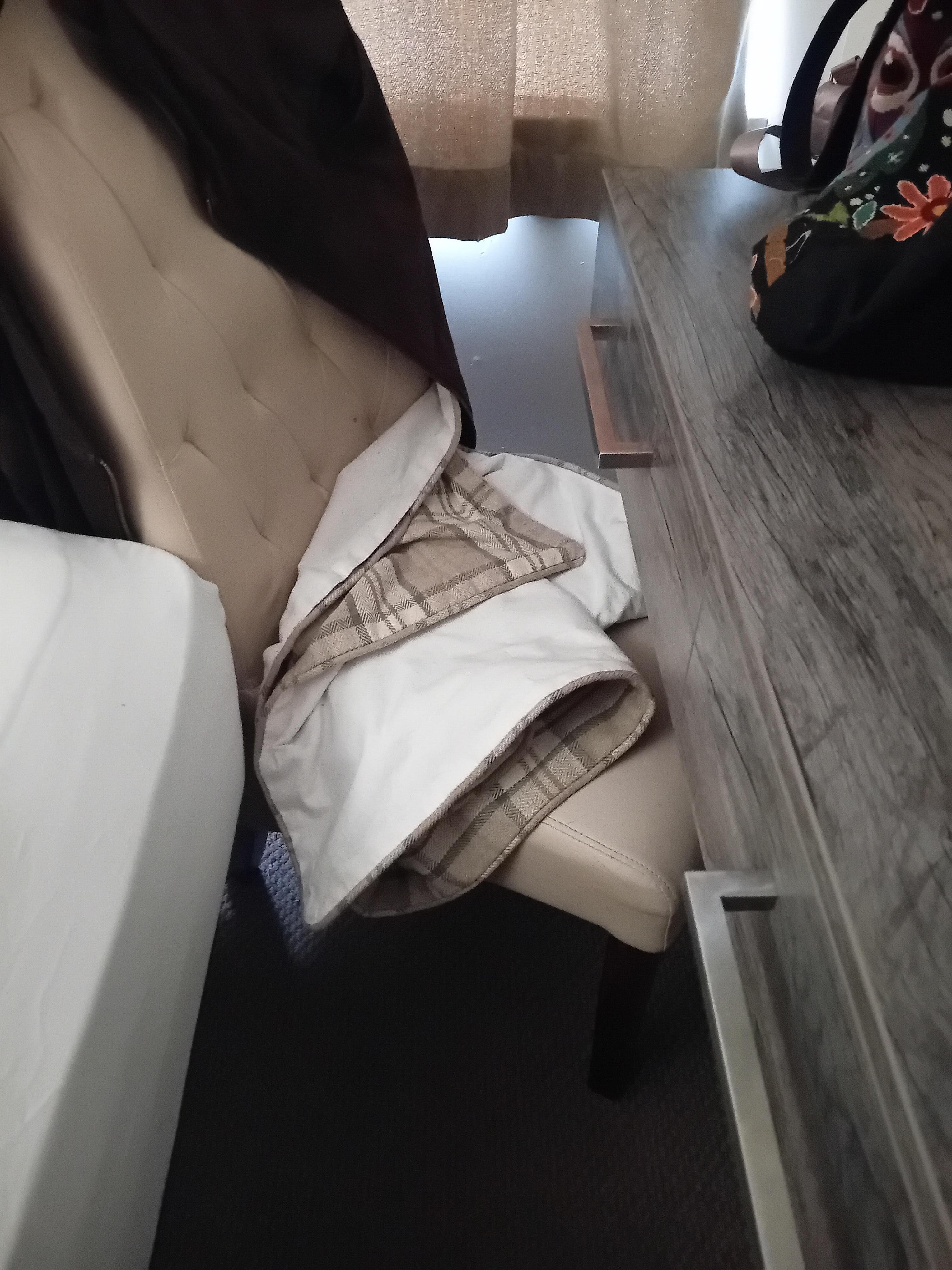 Bed table and seat wedged together