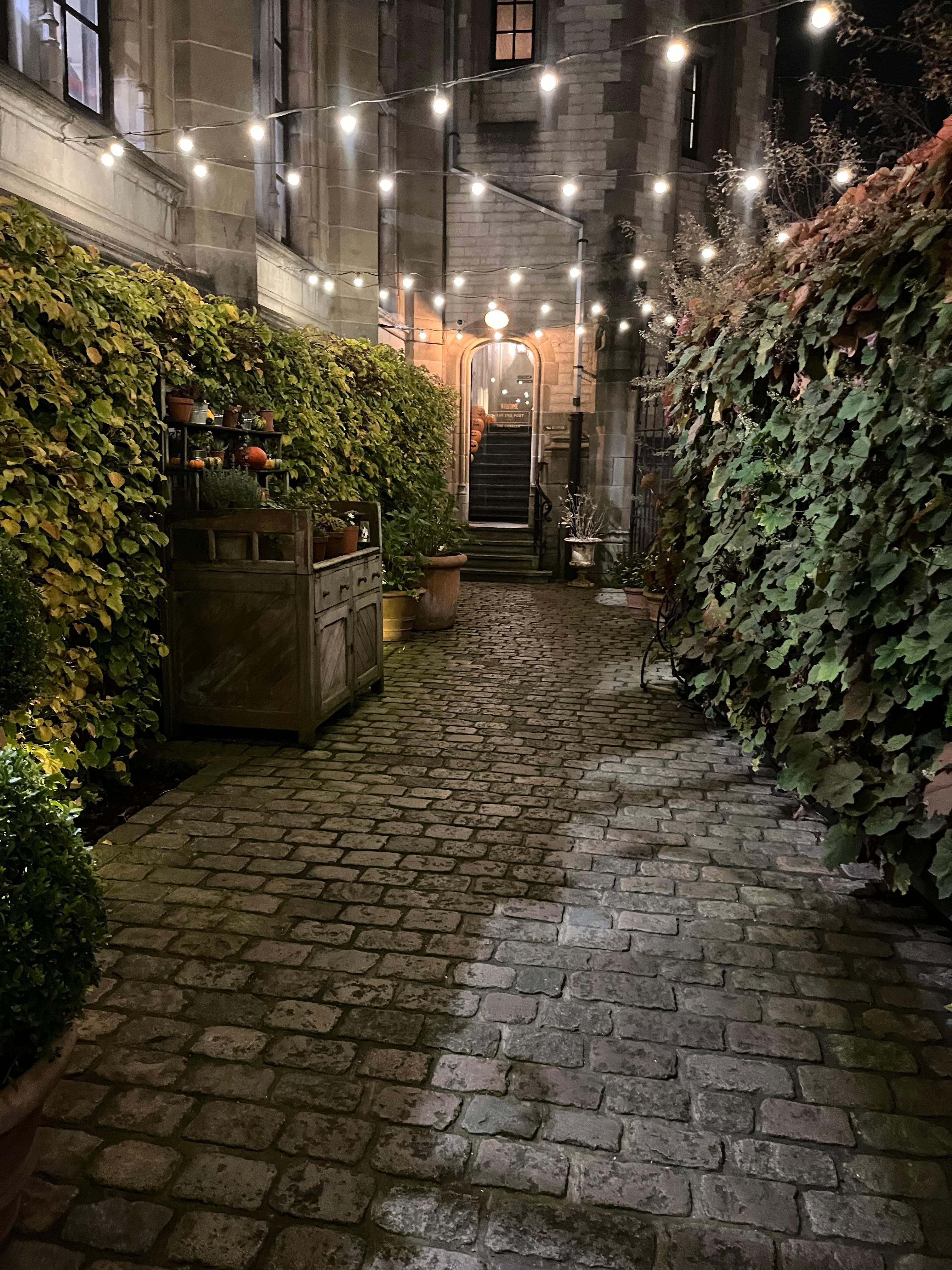 Courtyard entryway at night. 