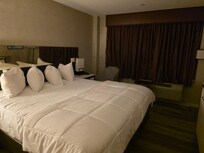 My room on the first floor, though out of the window there was no view at all apart from a broken hotel sign and concrete bridge!