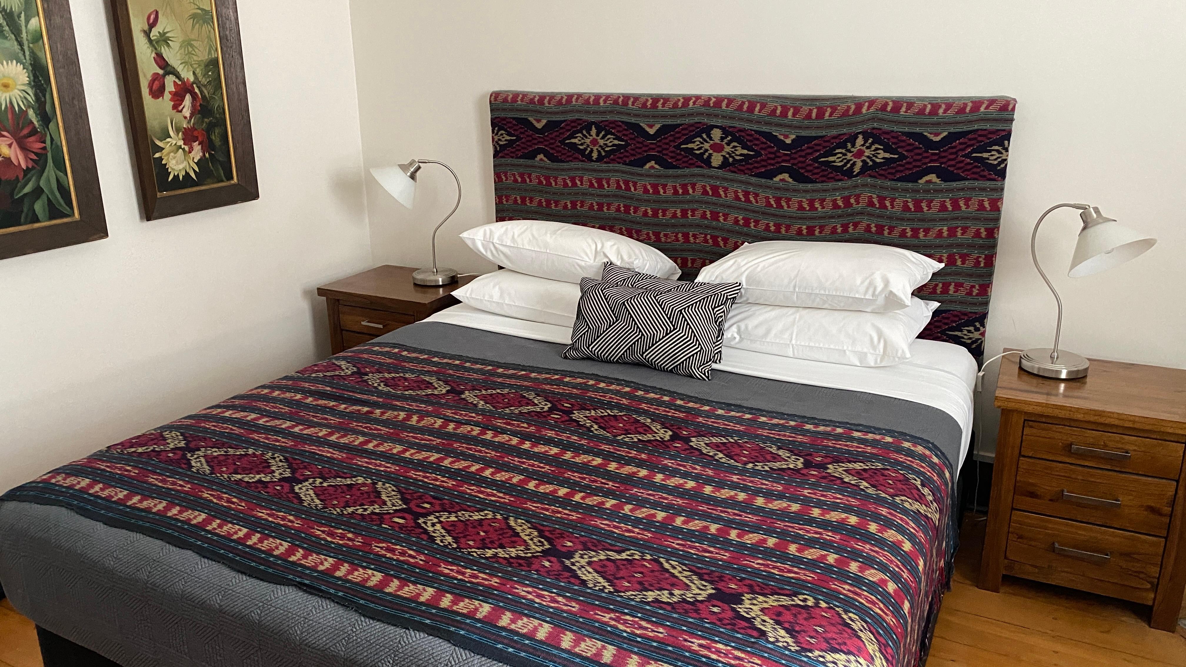 Ikat bed cover and comfy fluffy pillows