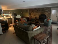 The Living Room. Nice fireplace!