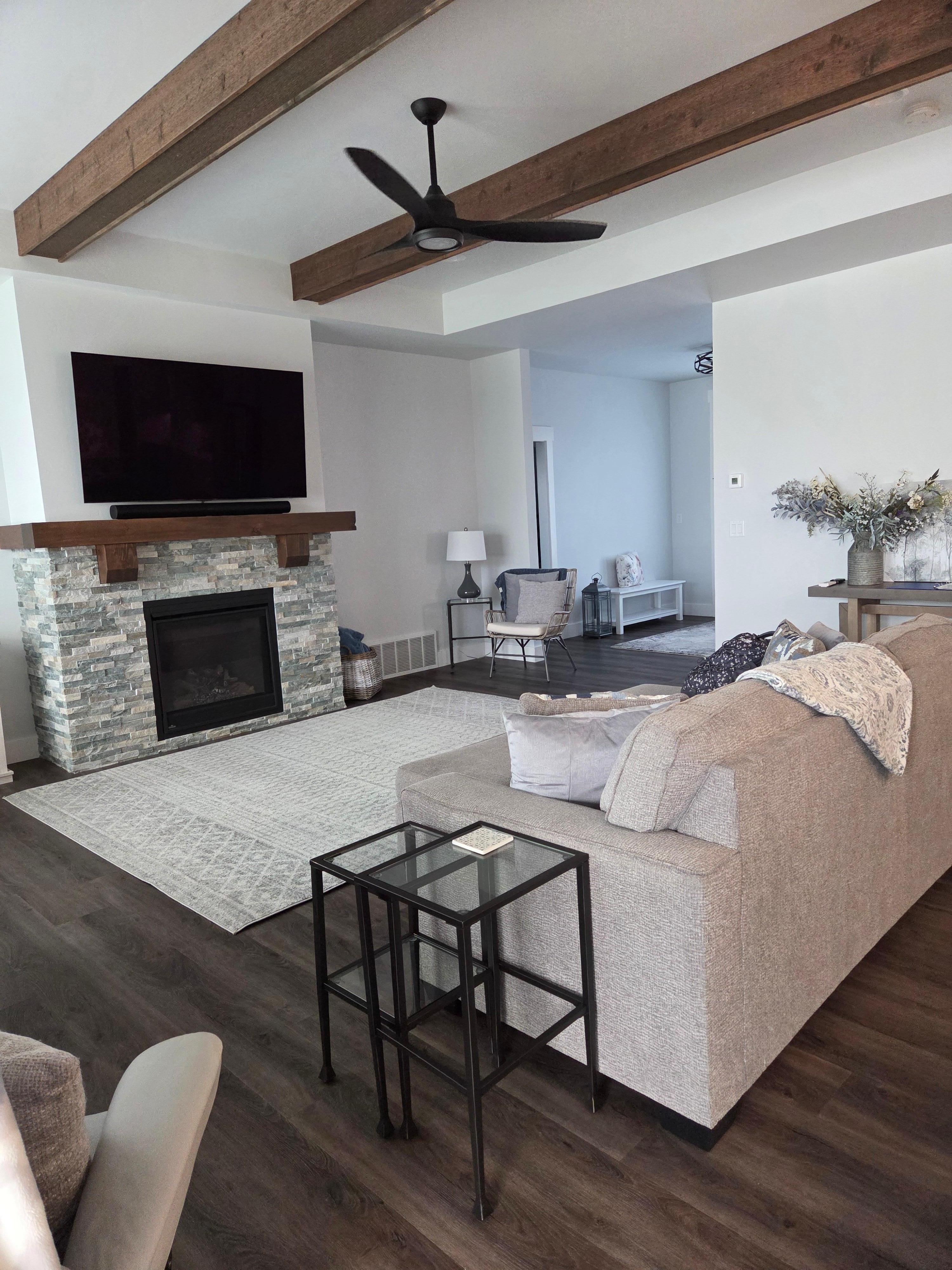 Spacious Open floor living room with Fireplace and Sonos Speaker