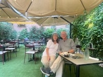 Garden area in the back where you can eat away from the busy street.