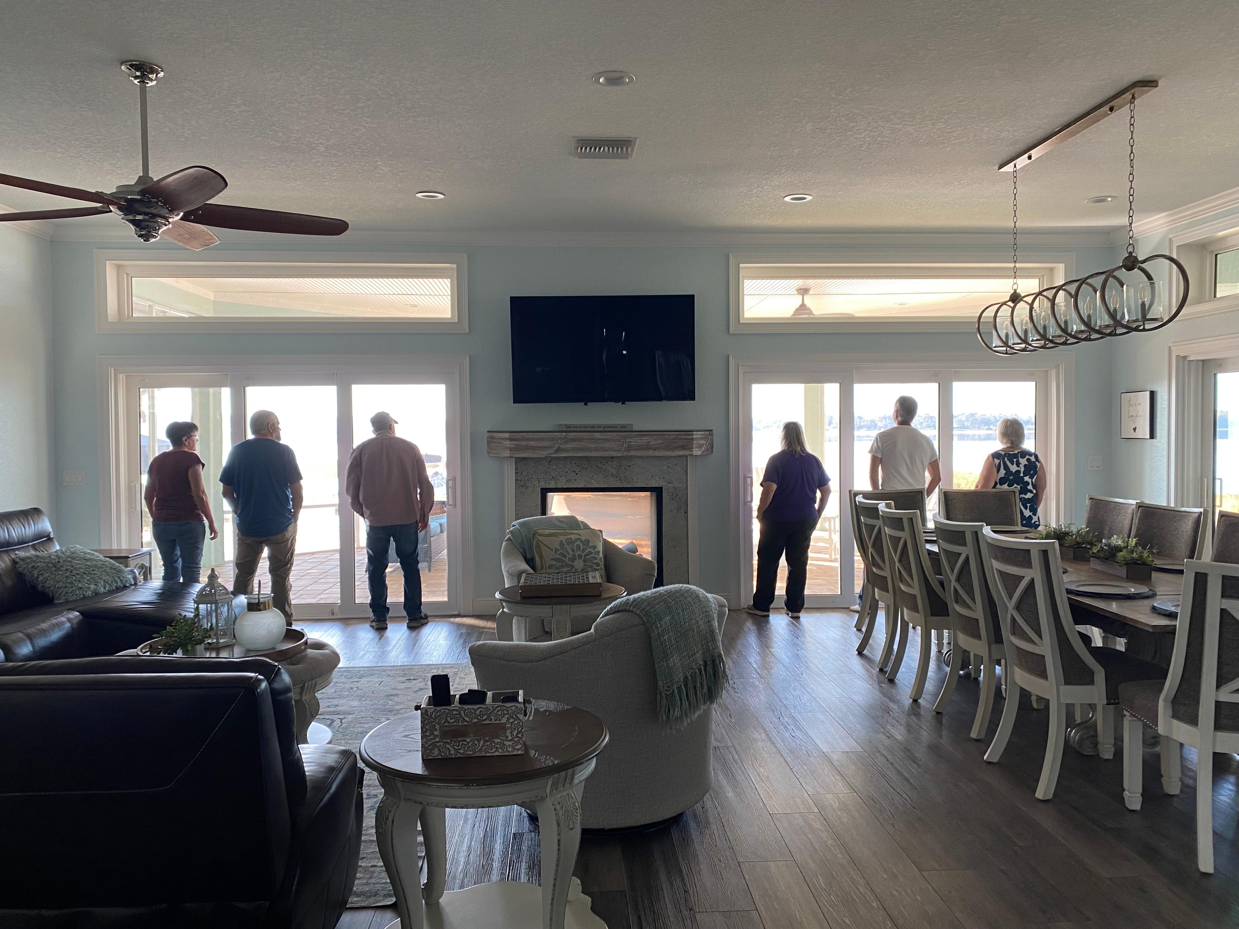Family getting their last look before leaving beautiful property.