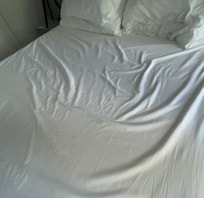 Stained bed sheet