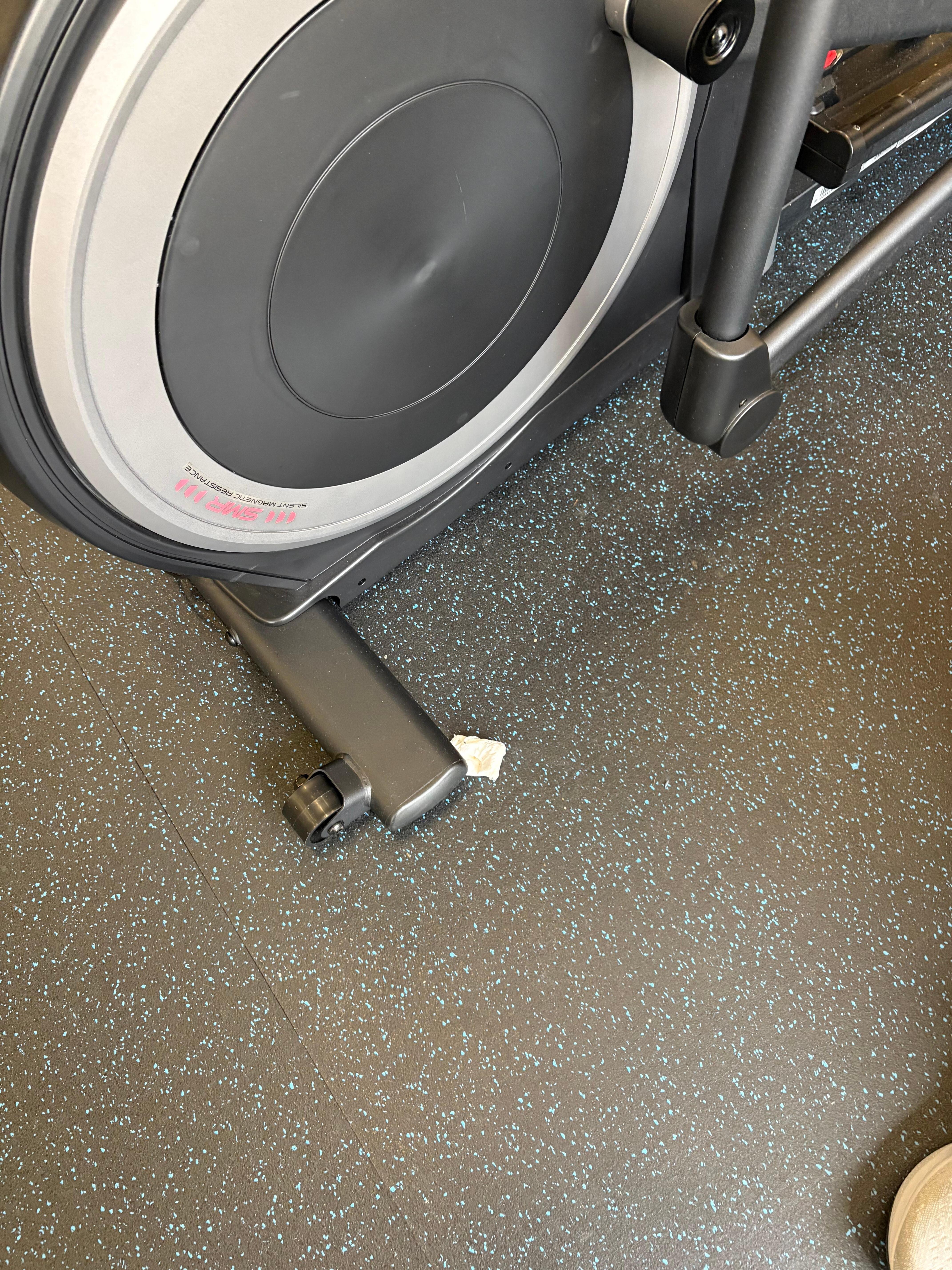 Eliptical had piece of paper towel under leg to stabilize machine 