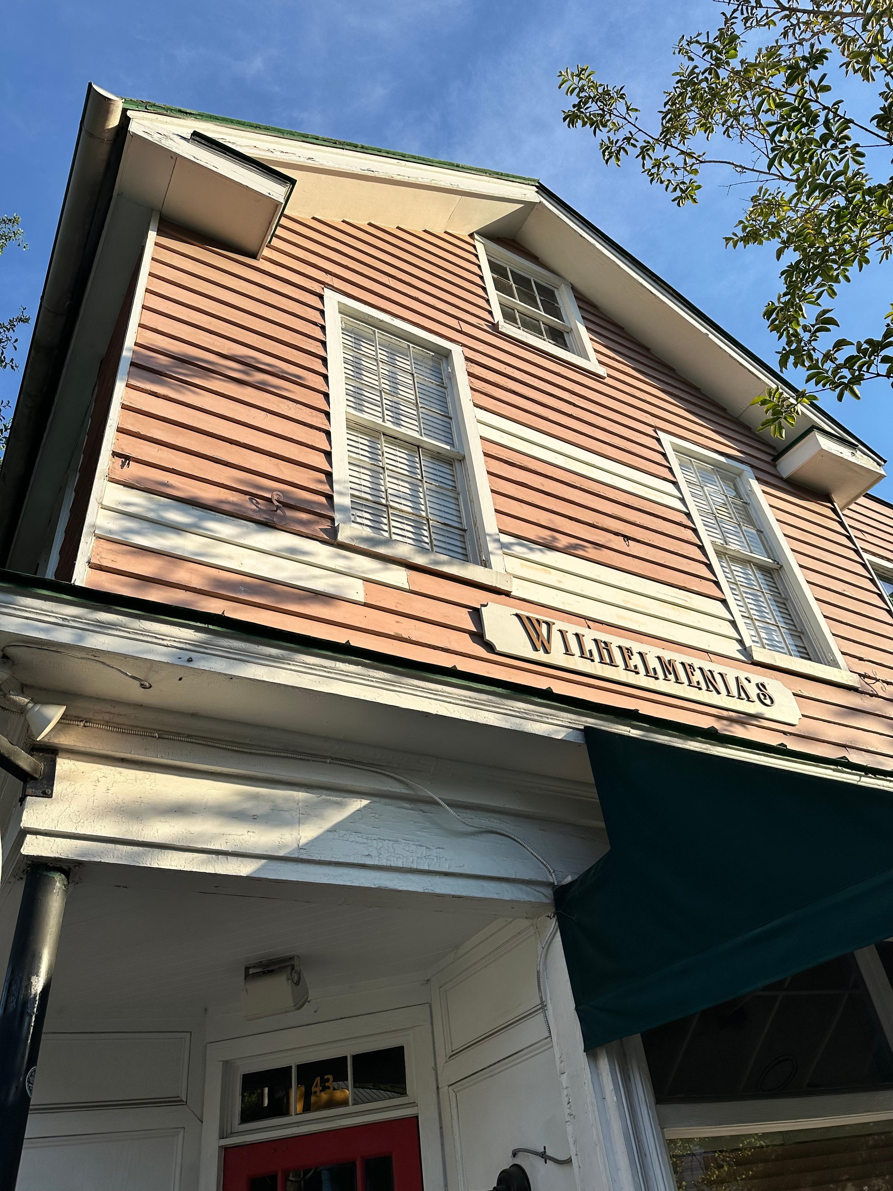 The upper unit/windows are the condo and the pink siding was being replaced.