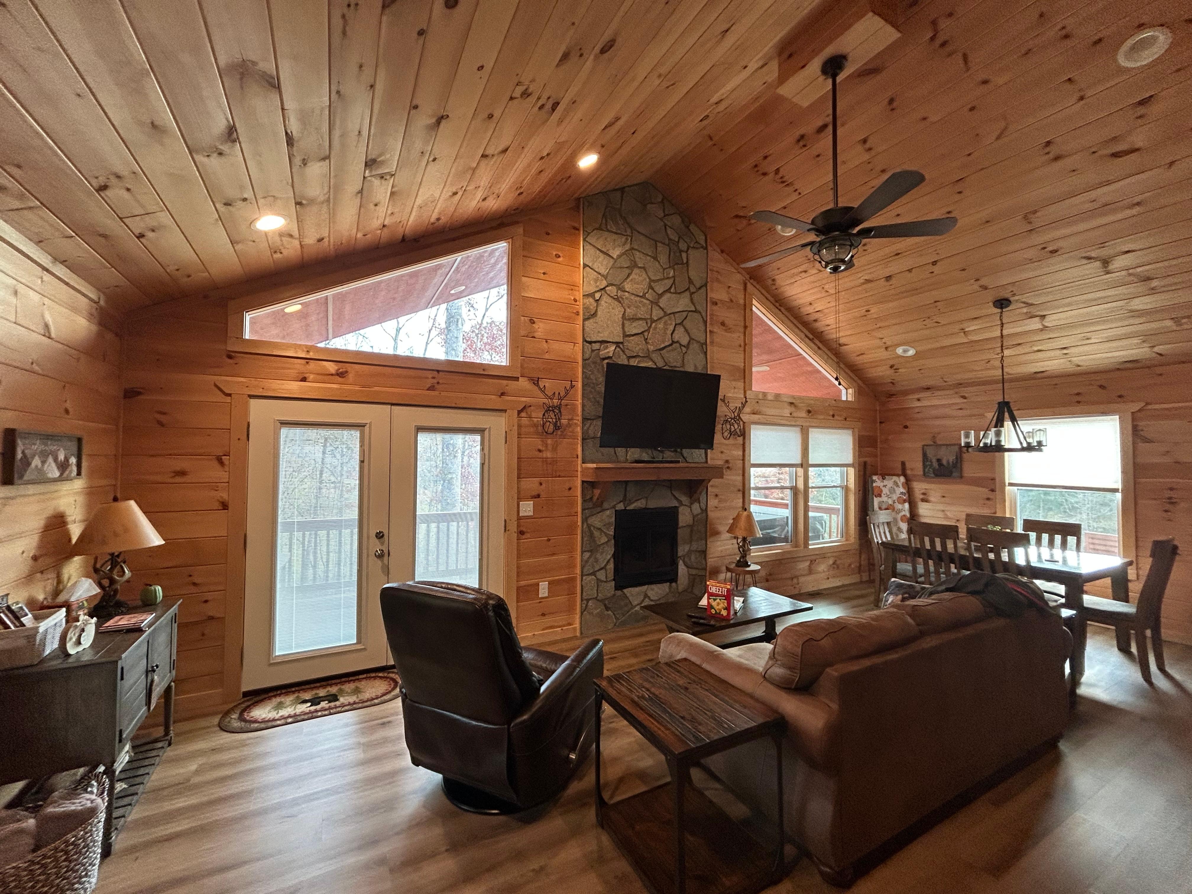 Beautiful living room with plenty of natural light during the day & recessed lighting in the evening. 