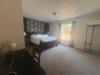 Amazing bed and large bedroom.