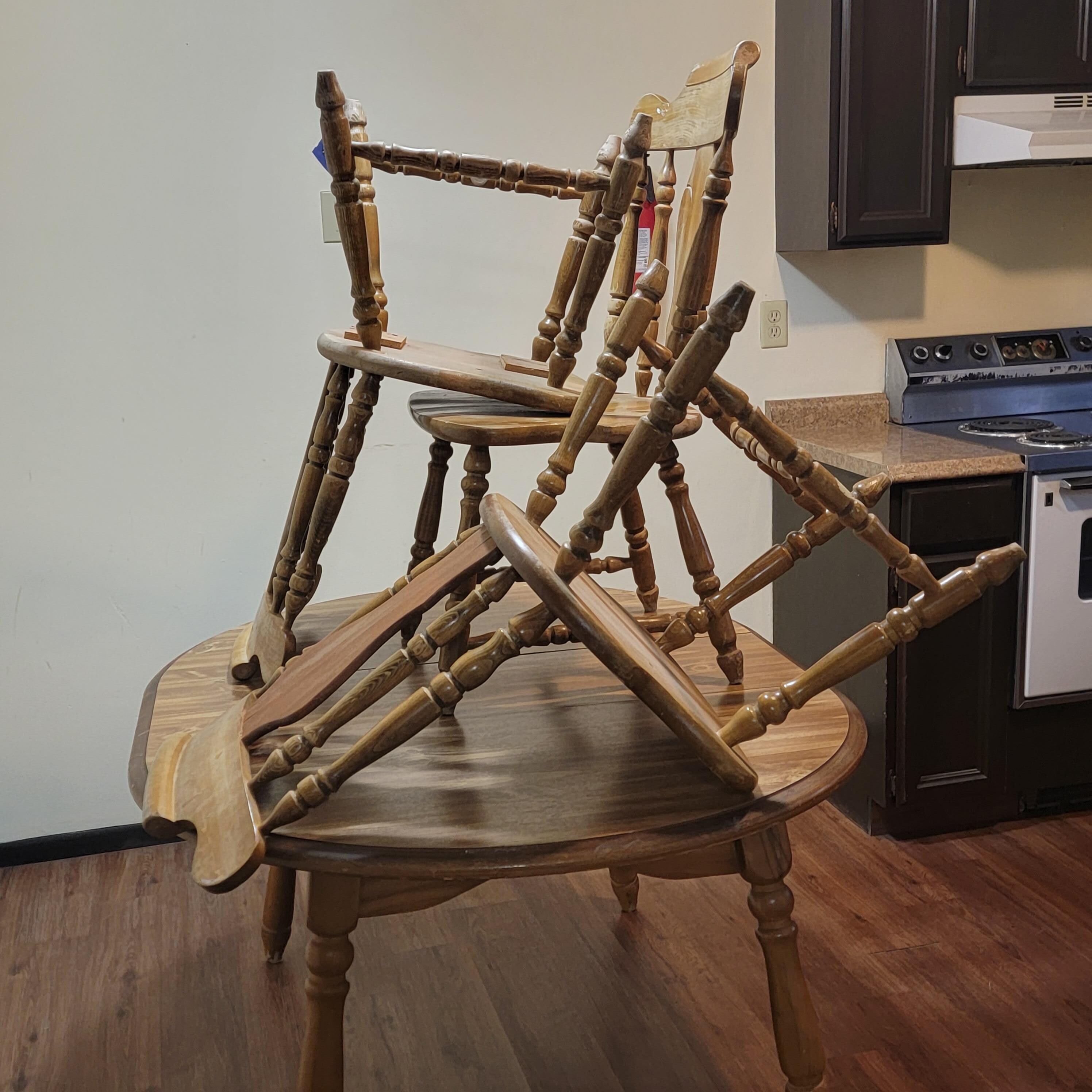 I guess they put the chairs on the table to wash the floor.