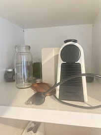 coffee machine in random cupboard