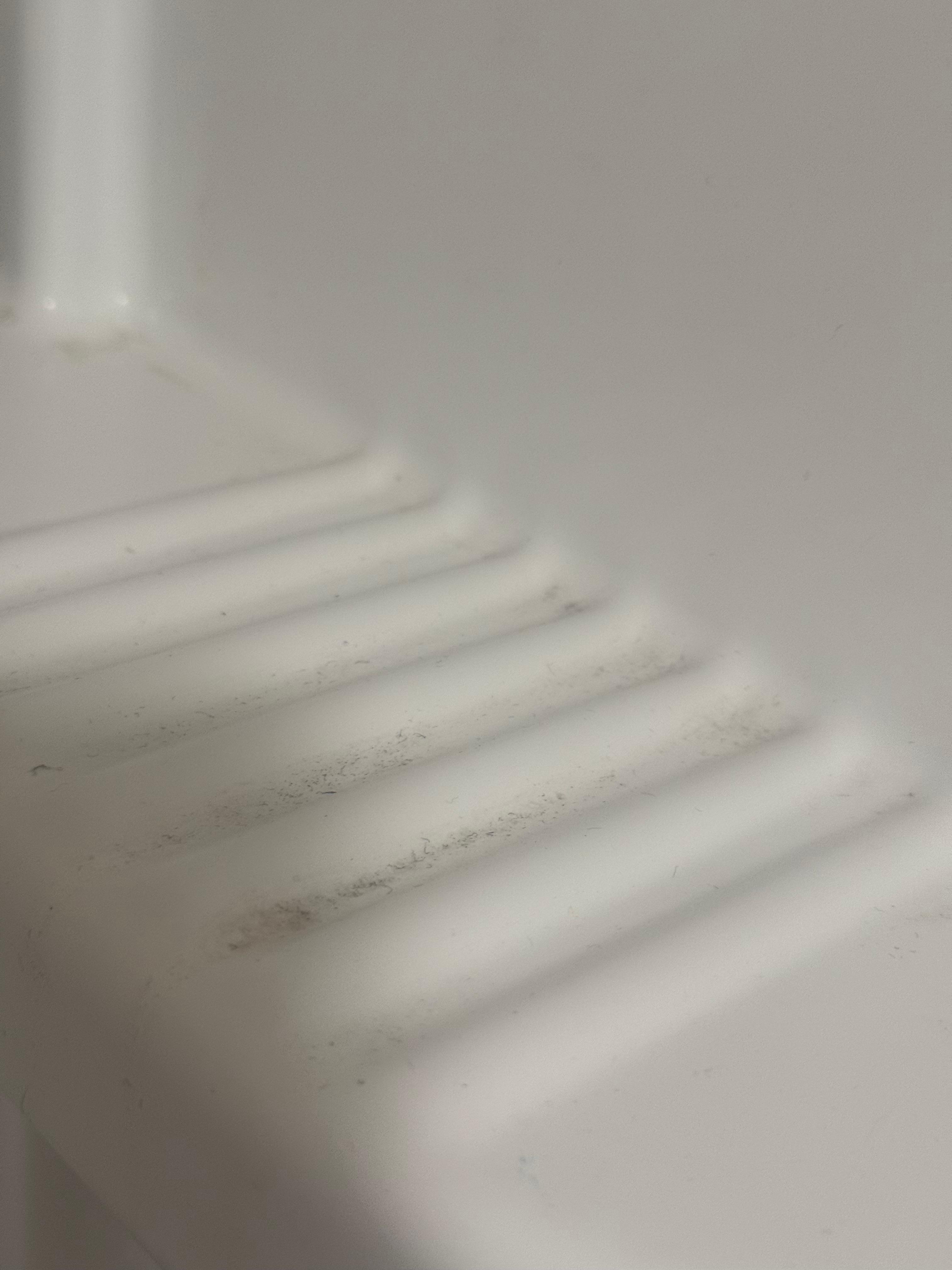 Shelf in shower was dirty 