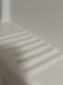 Shelf in shower was dirty