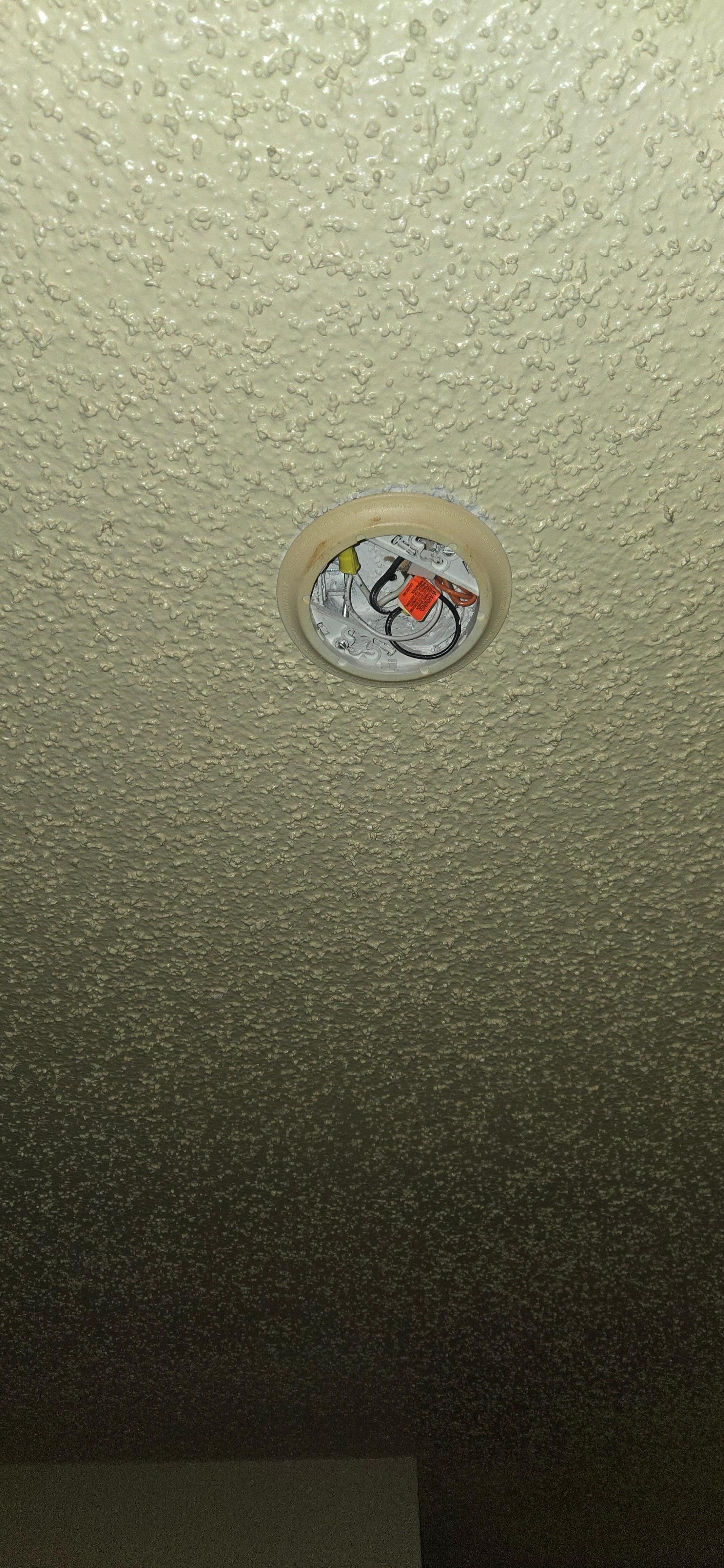 No smoke detector, exposed live wires 