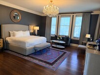 Bedroom with king bed and sofa