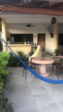 Outdoor kitchen and living area