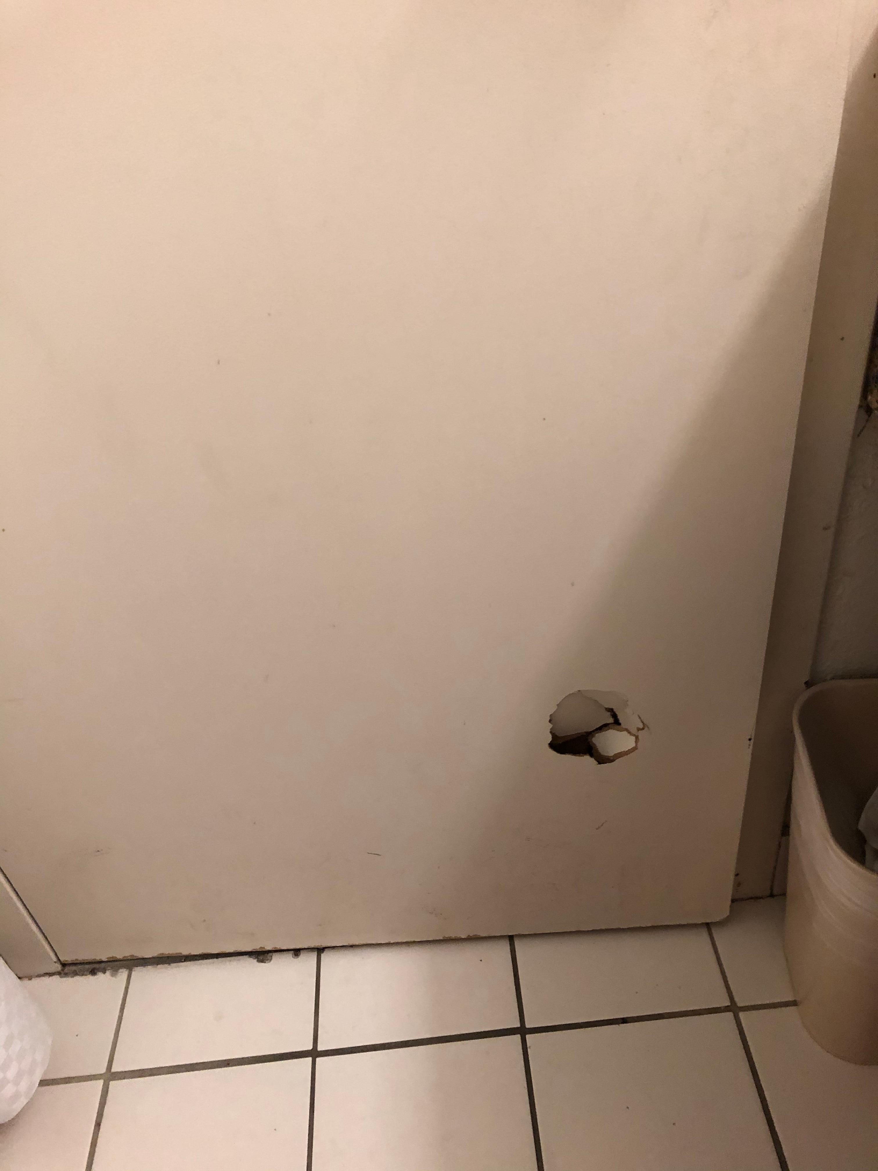 Hole in bathroom door