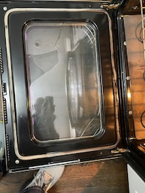 Broken oven glass in door