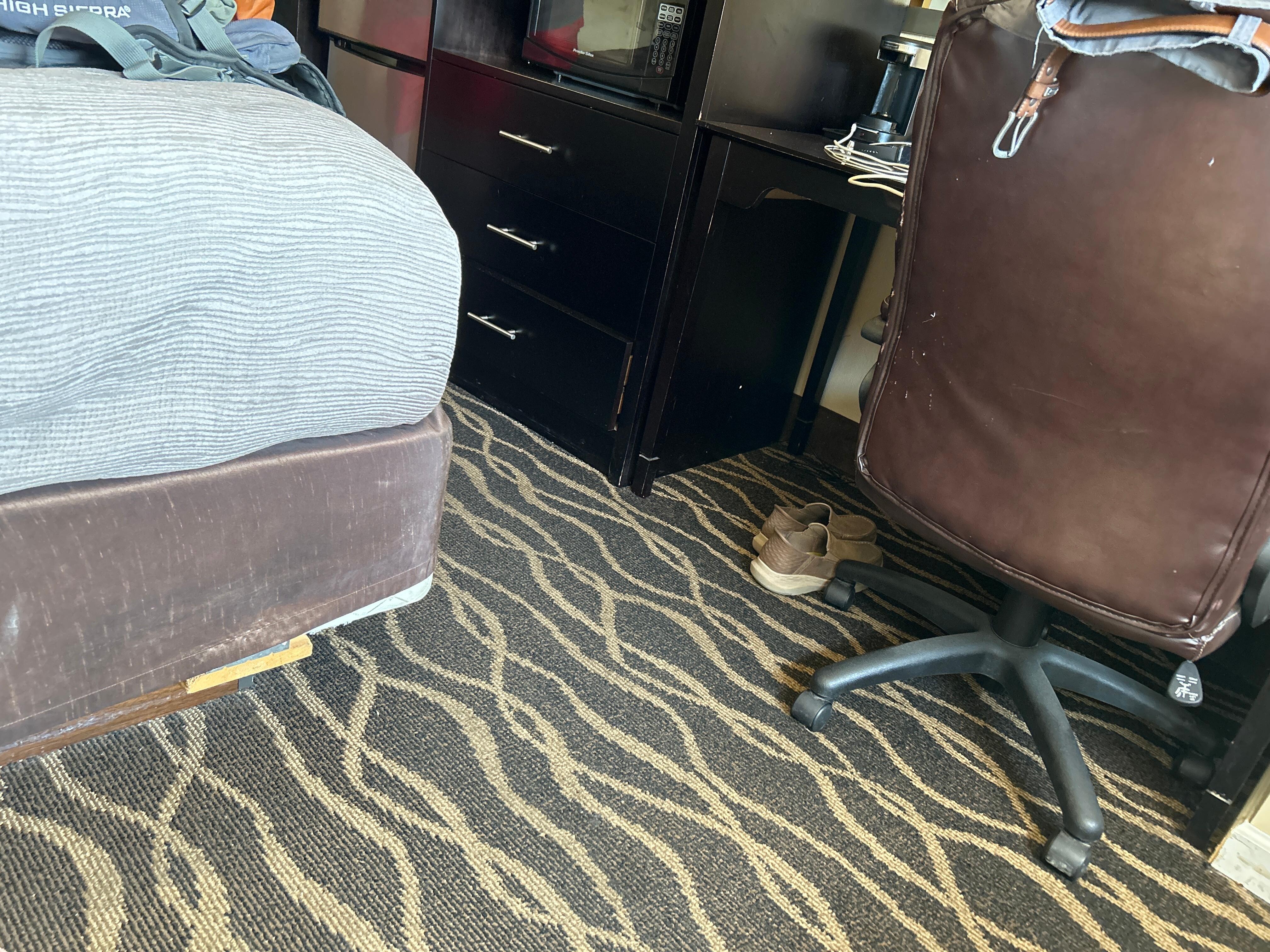 Desk chair and end of bed