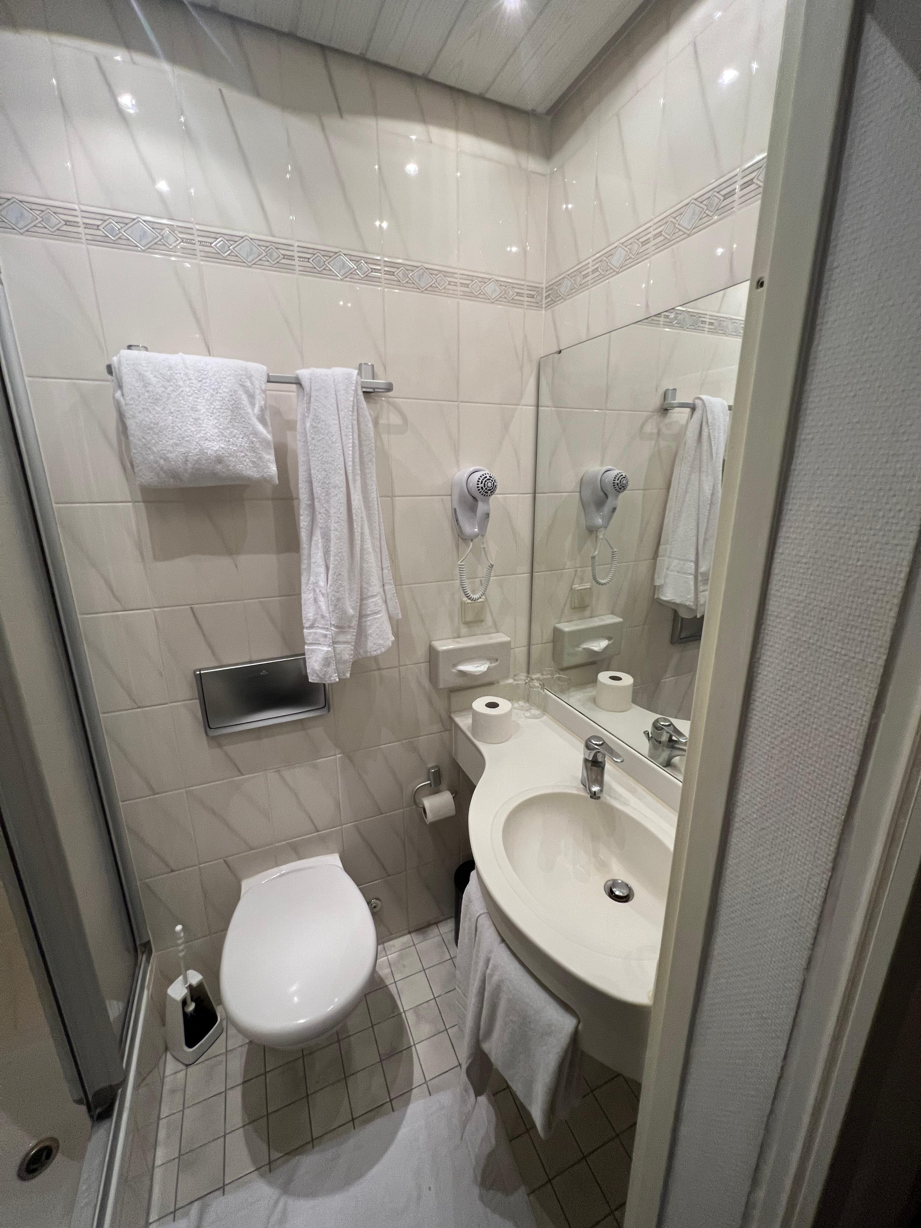 The bathroom is small in size but clean and in perfect working order.  No discomfort found.