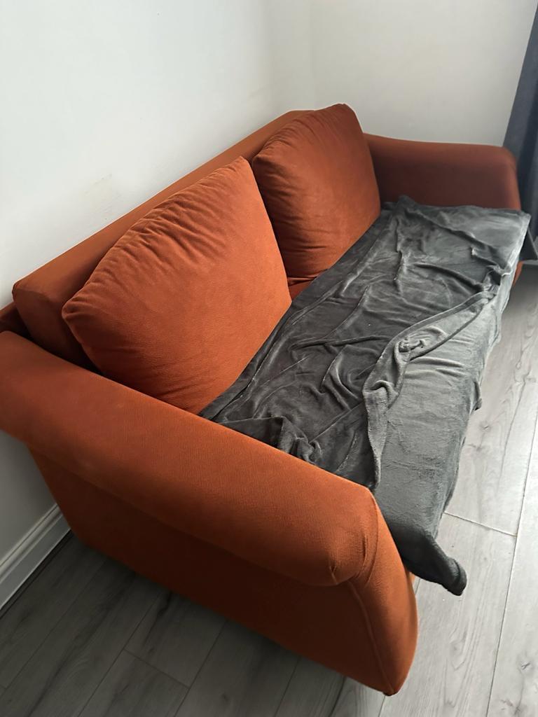 Stained old/tired sofa bed