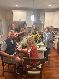 Family and friends building floral arrangements for wedding festivities!