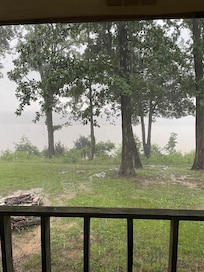 Deck off house with river view