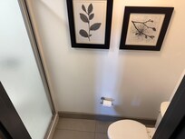 Micro-bathroom with single stall shower