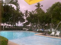 Pool time beautiful evening light from the bar stools