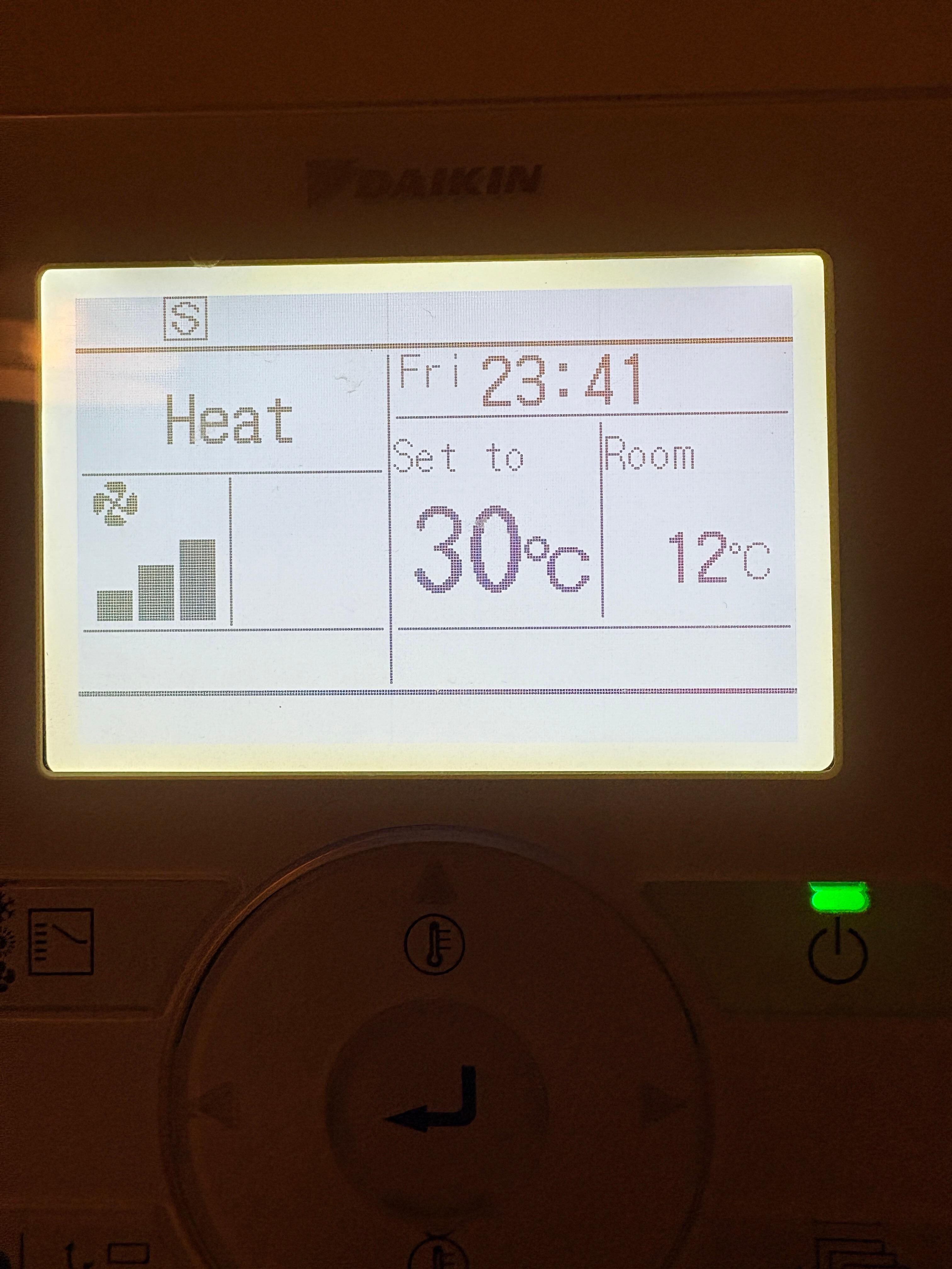 Photo of air con panel taken on Friday night after running air con for more than 5 hours.  The air con was set to heat at 30degrees and room temperature was 12degrees.  We froze!
