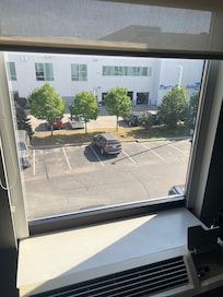 “City view” is a parking lot.