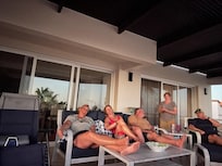 Hanging out on the balcony.