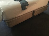 Nasty old box springs under comfy mattress.