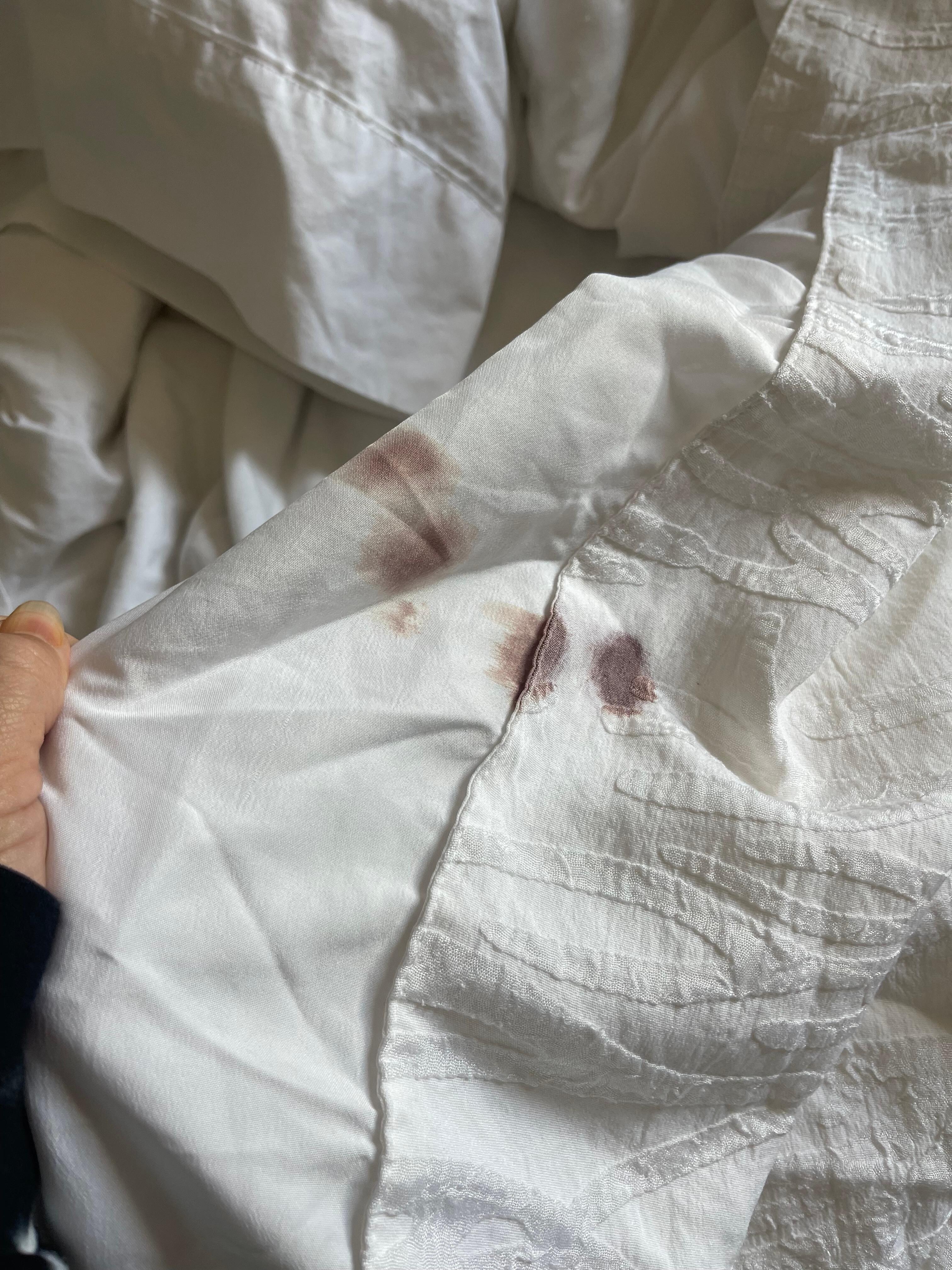 Old dried blood found tucked under after sleeping with this comforter!