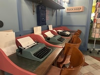 Typewriters and stationery in the lobby.