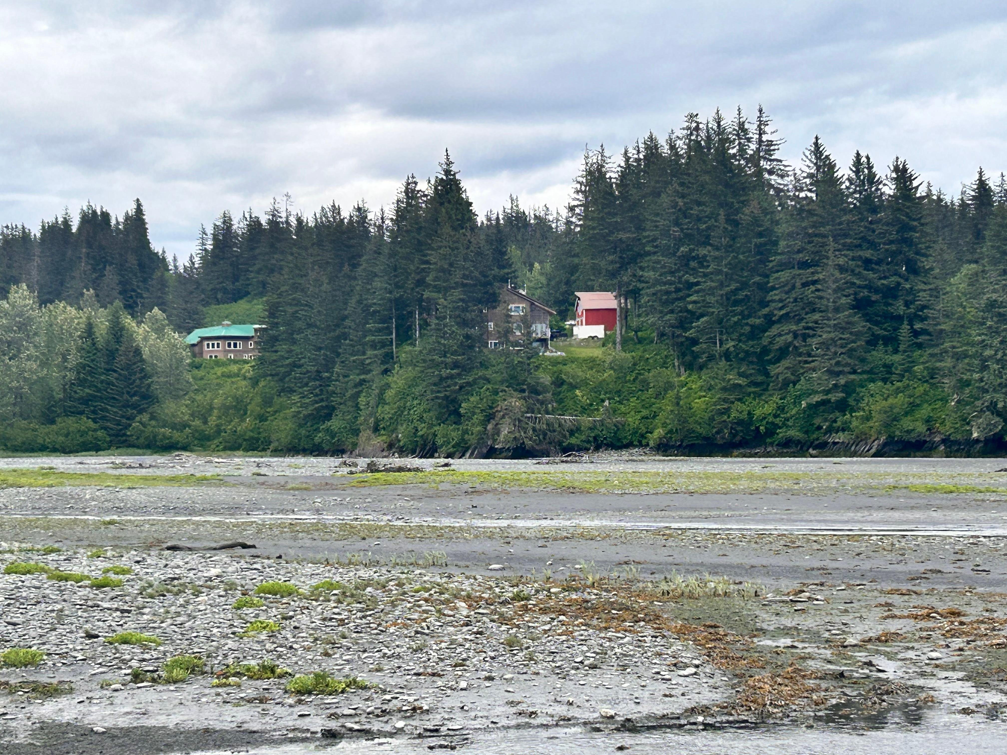The house view from the trail and beach below