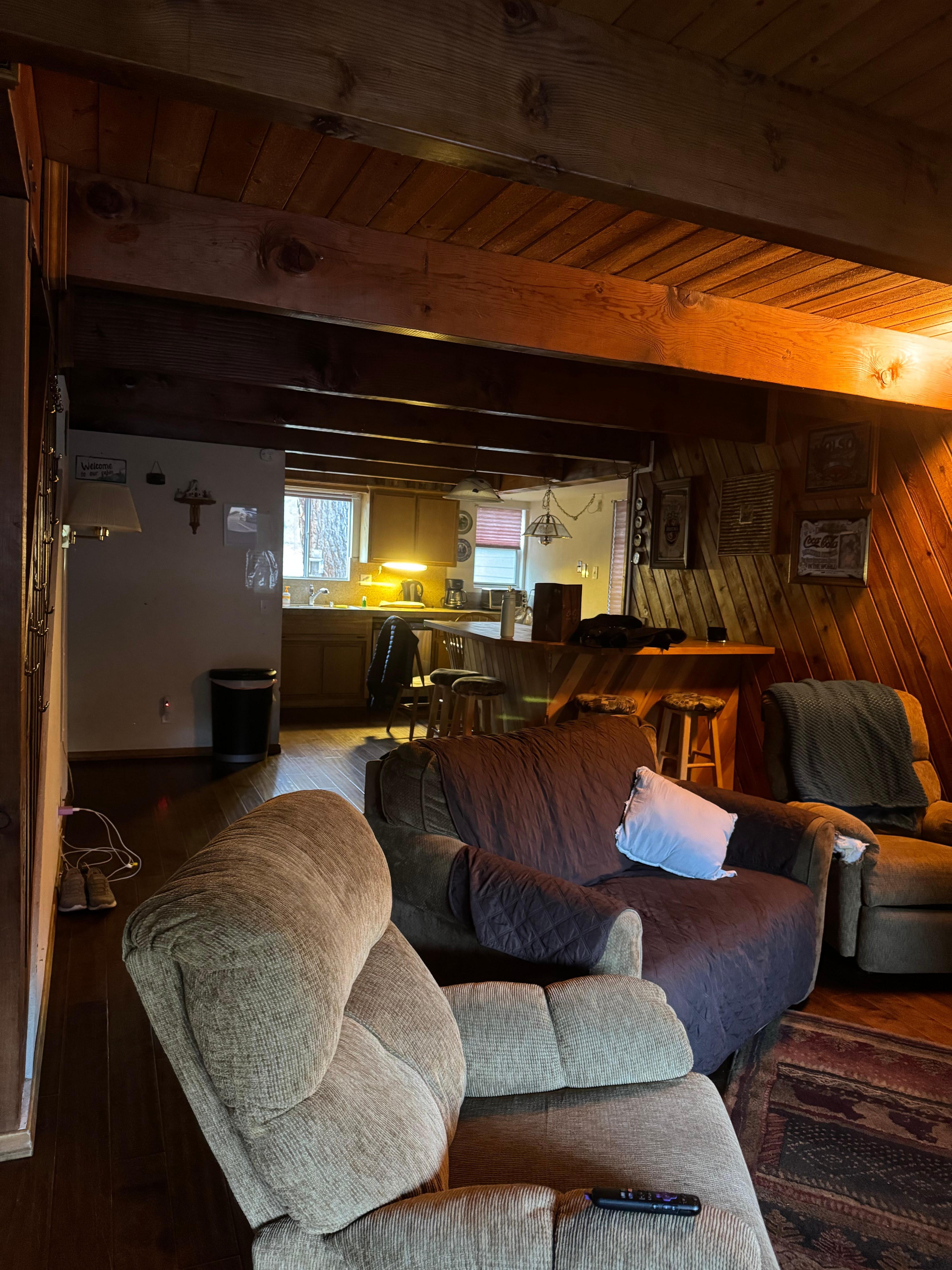 Standing in the kitchen, looking into the family