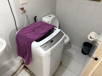 The iPhone makes it look like there’s enough room to walk pass the washer to get to the toilet. It’s actually a tight fit.