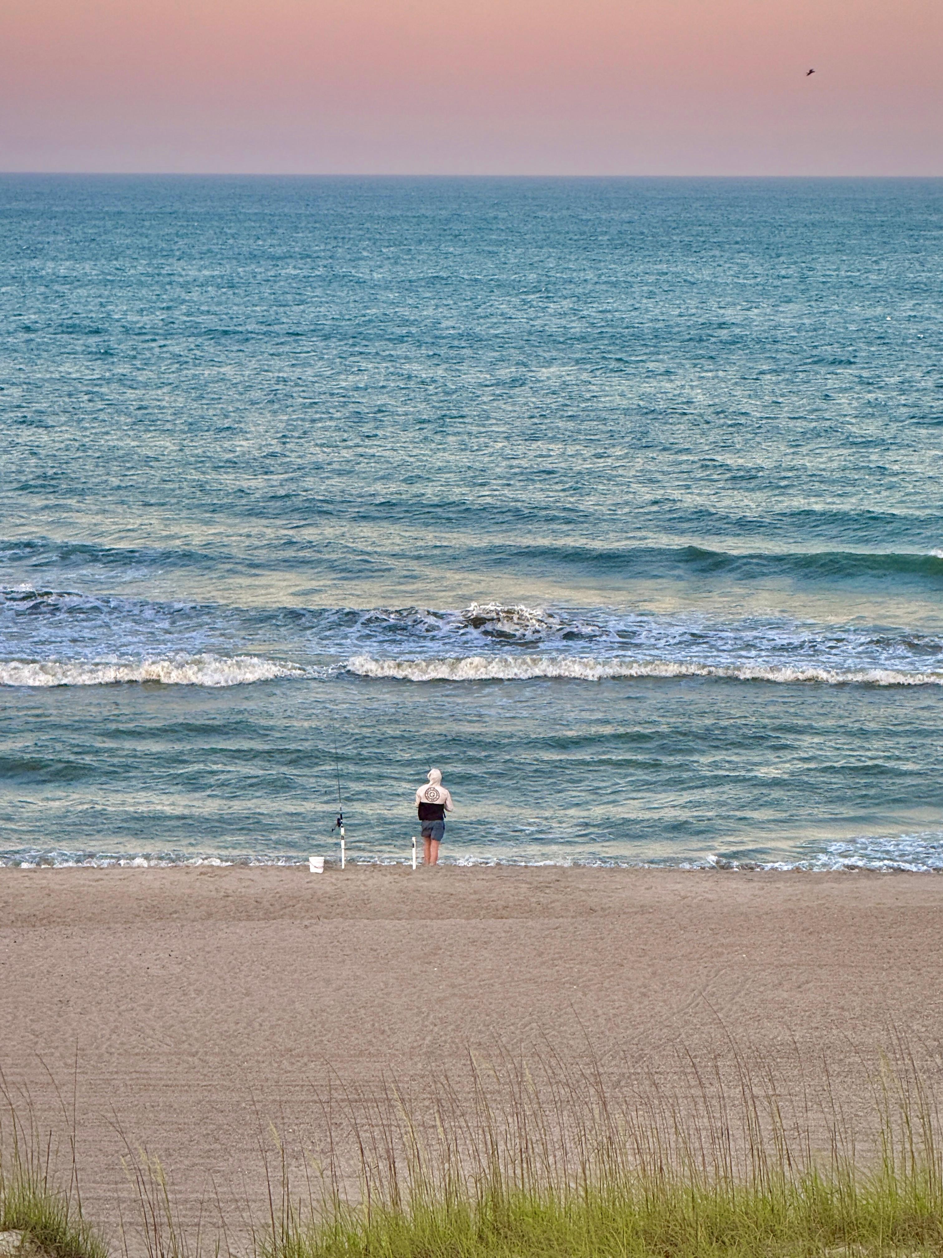 Watching my son fish from the balcony