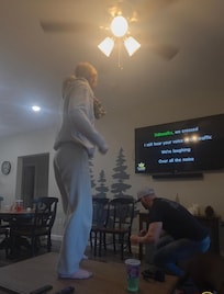 These 2 doing karaoke and crazy dancing.