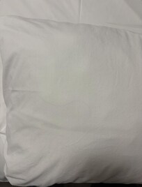 Hair inside the pillow case.