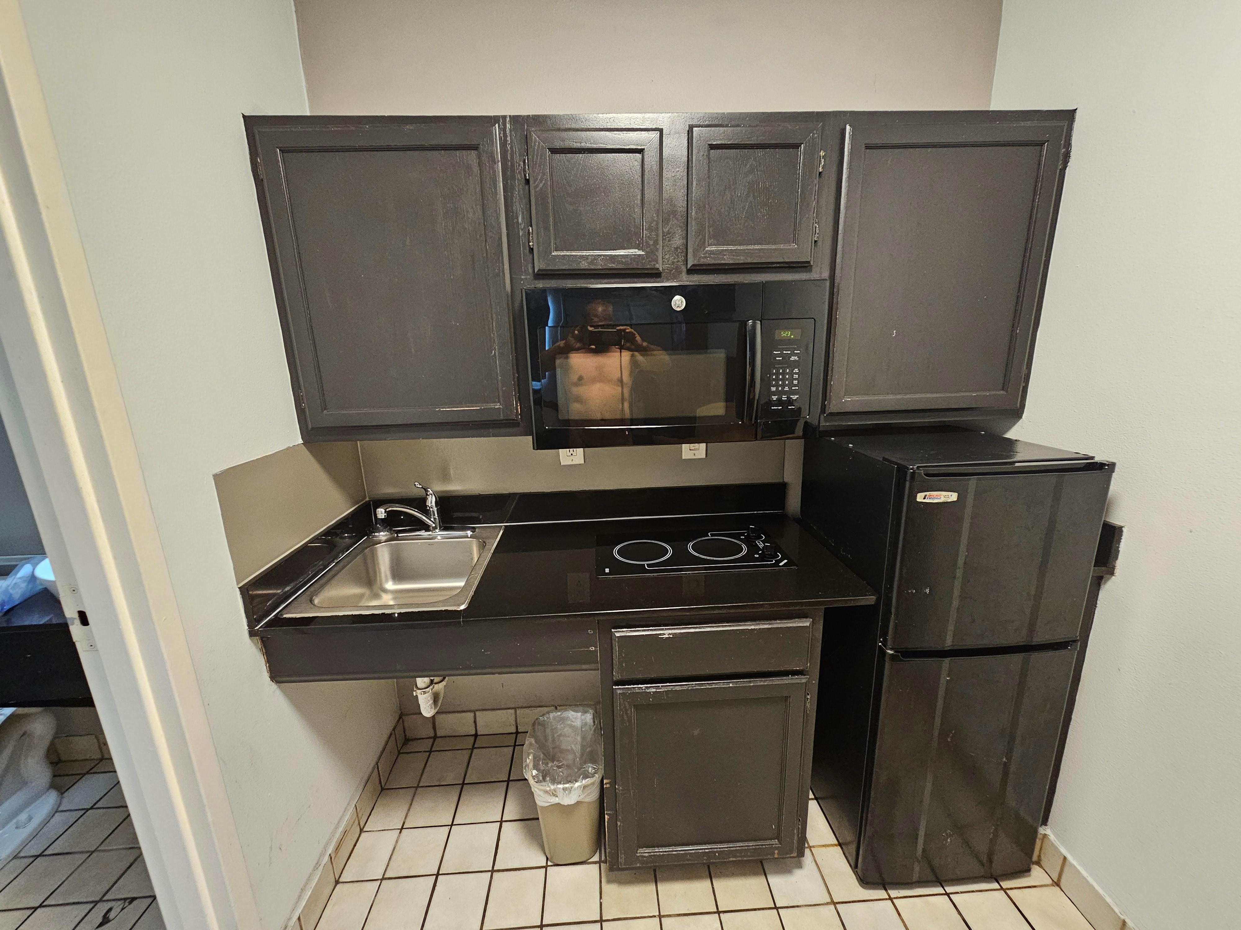 Cabinets looked worn.