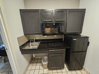 Cabinets looked worn.