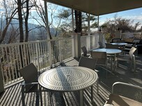 Outdoor porch space near breakfast area
