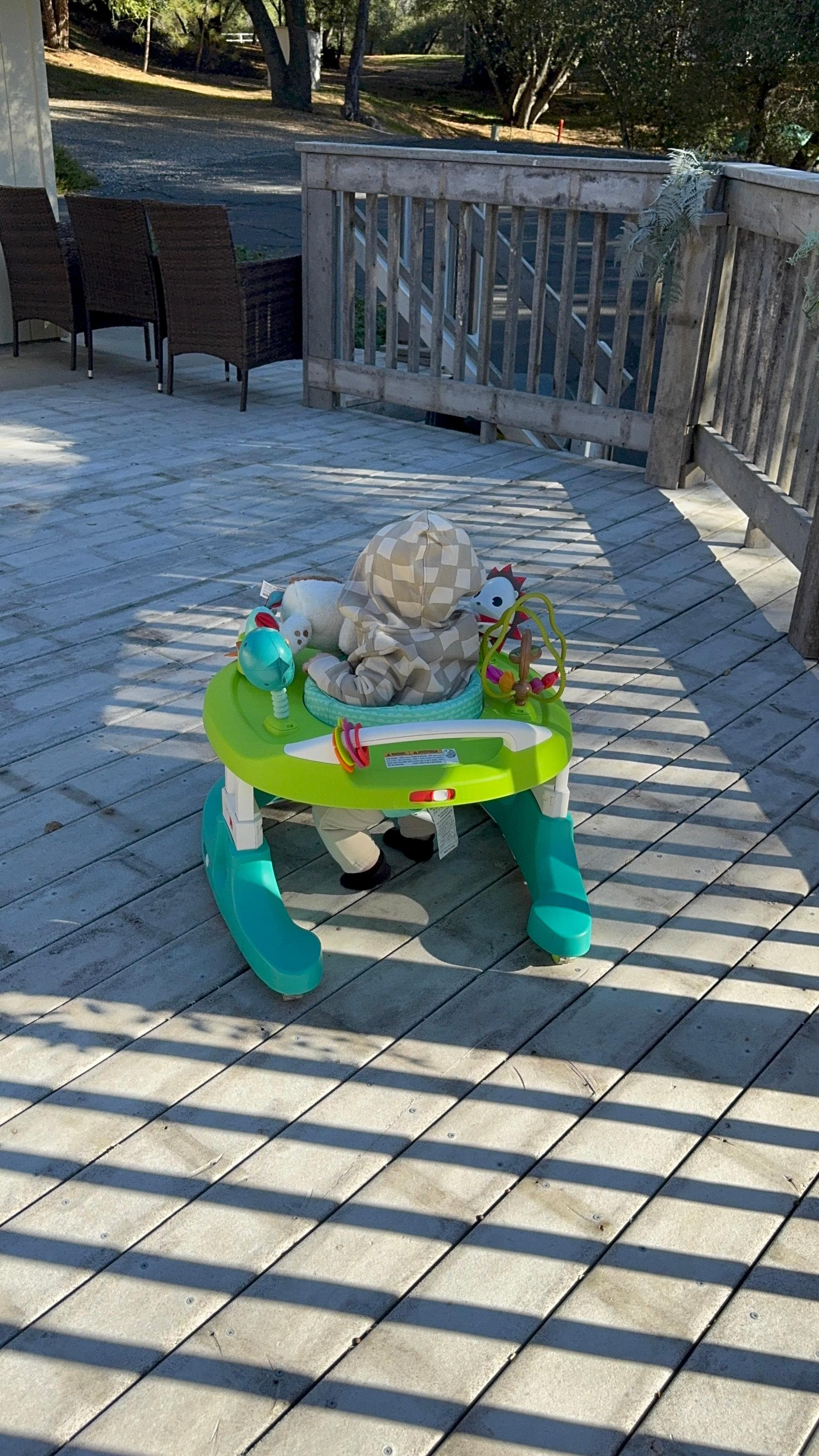 Grandson zooming on the deck!