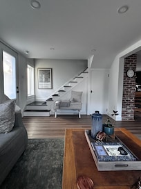 Living room and stairs to bedrooms