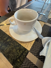 The size of their coffee mug with no refill