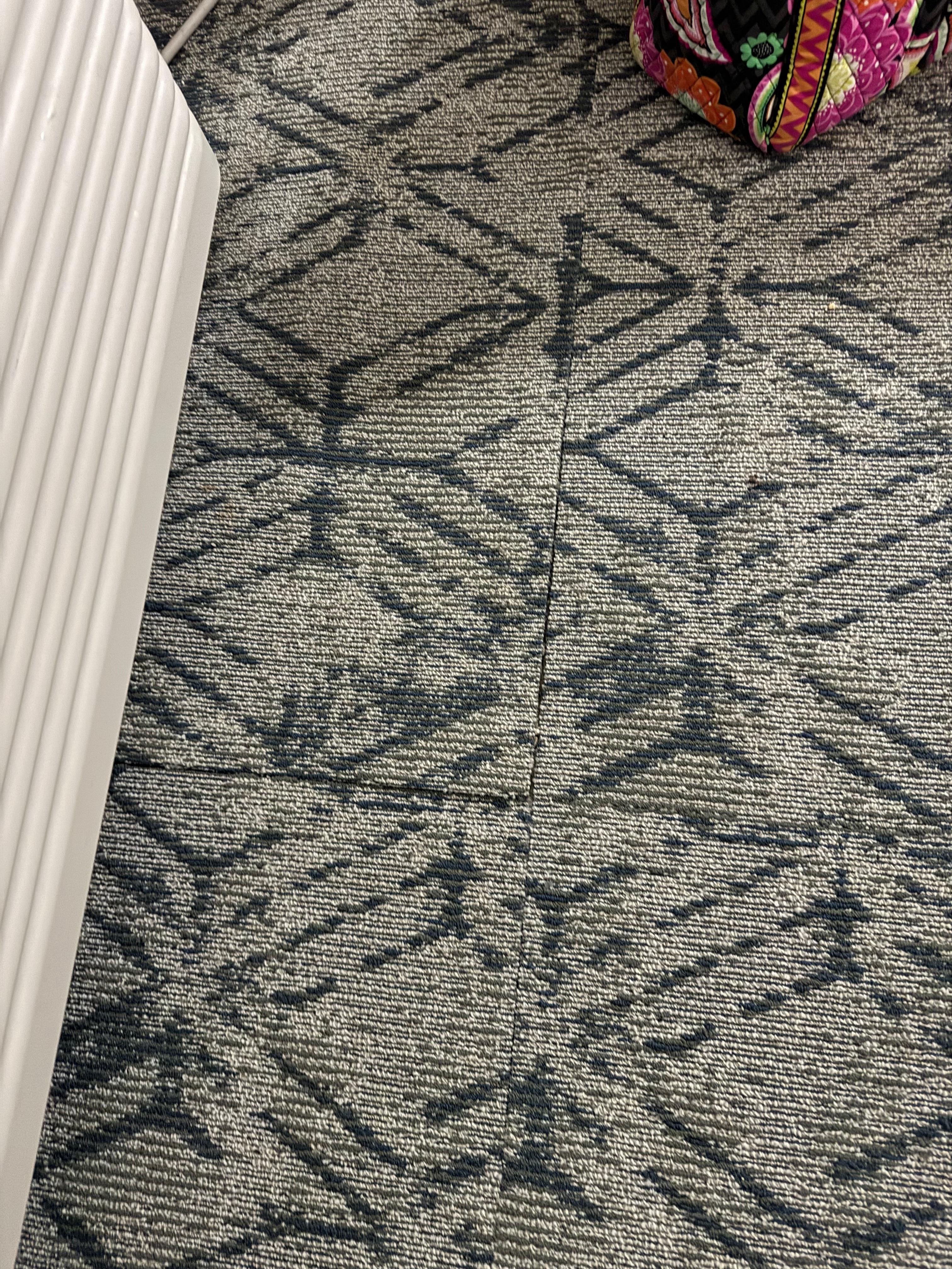 Carpet not installed all the way. 