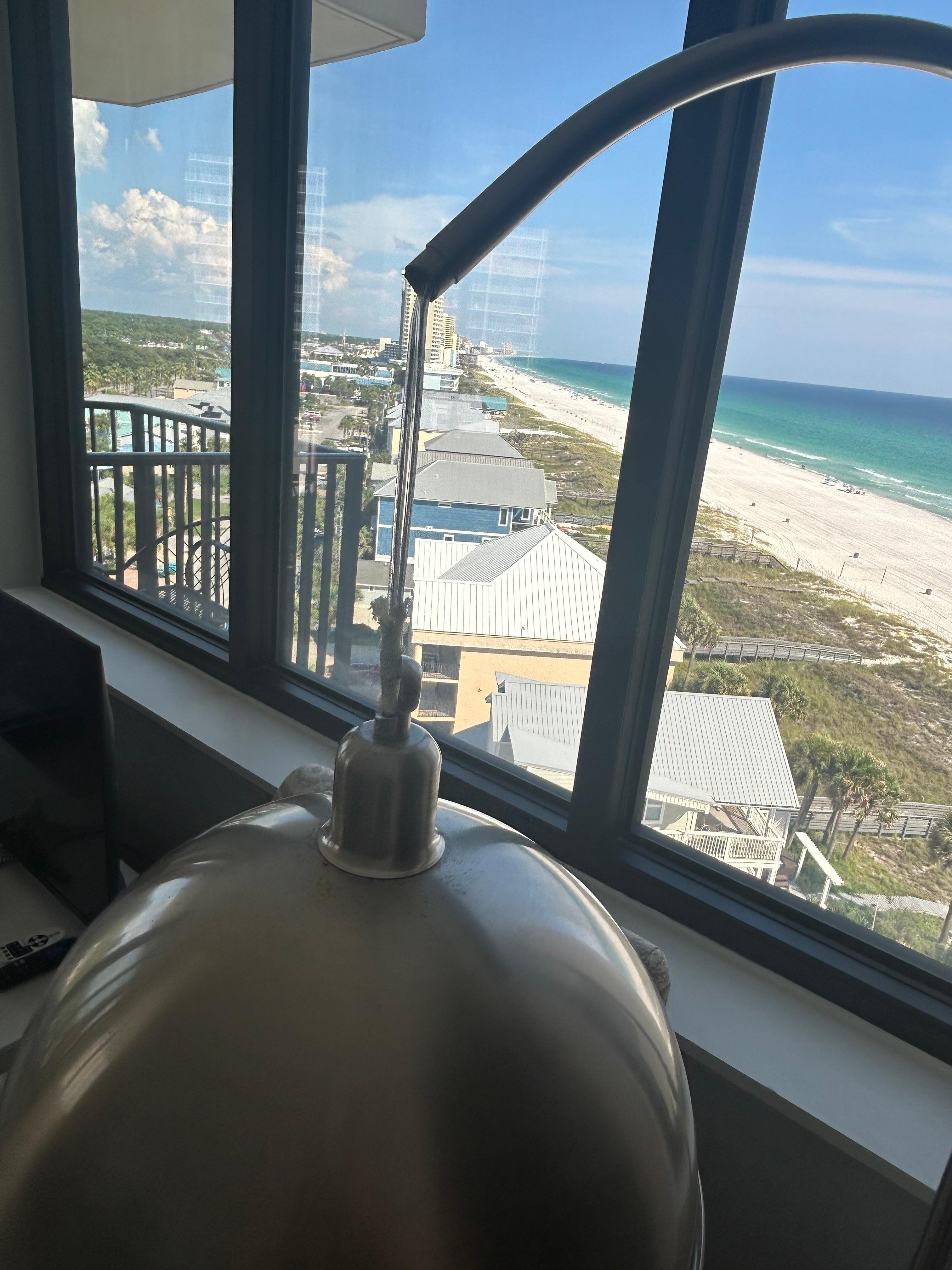 the lamp that’s hanging from the wire 