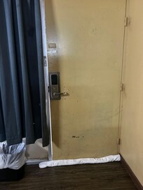 Door does not reach the sides nor the floor. So you hear everything, smell everything, also one of the ways the roaches come in